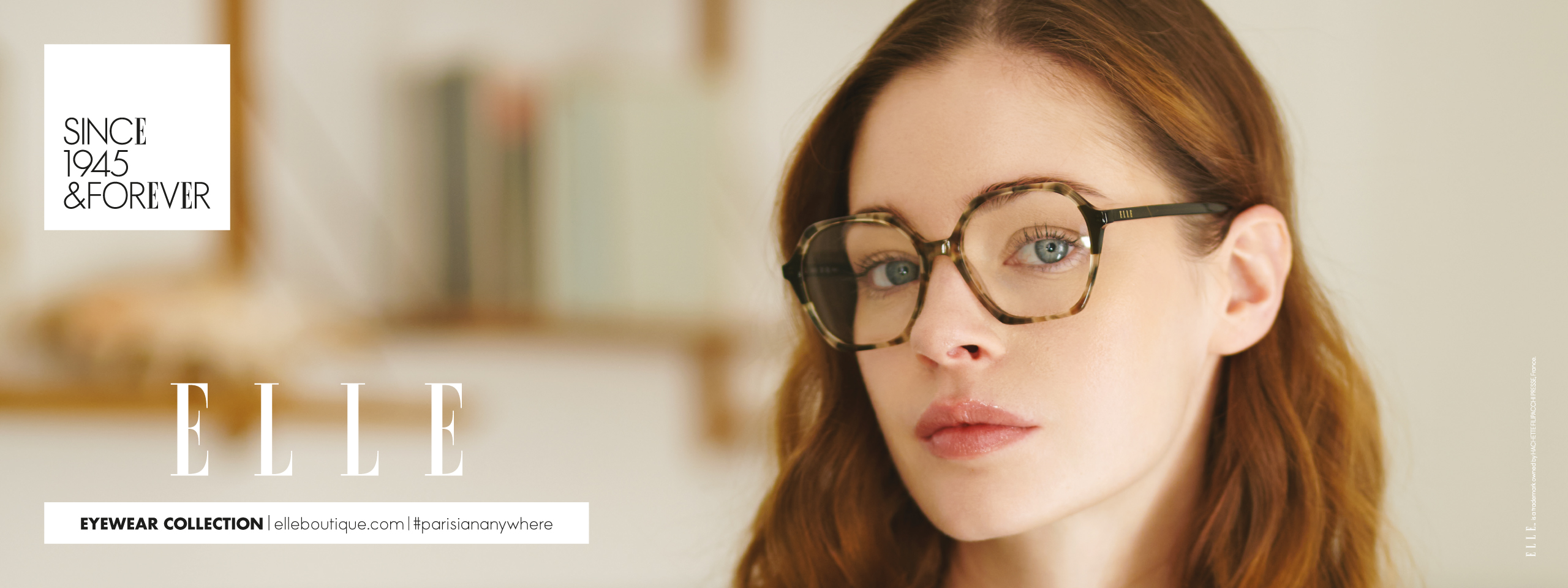 Elle: Frau mit Brille